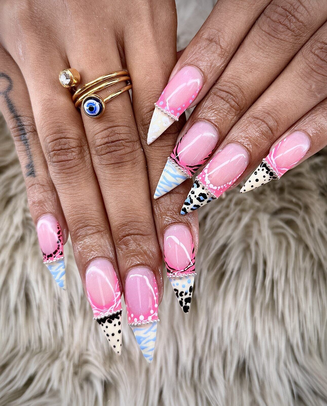 Pink stiletto full set with hand-painted animal print tips