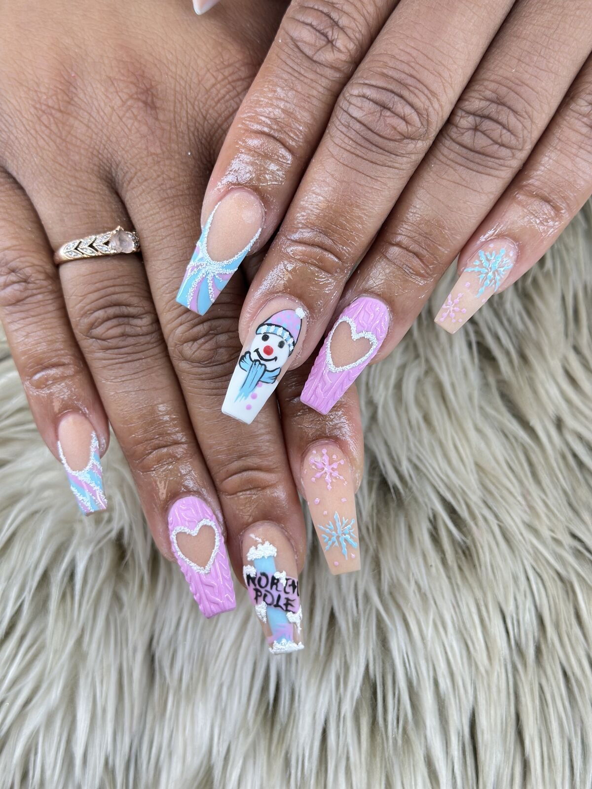 Winter nail art set with snowman, snowflakes and knit-sweater texture